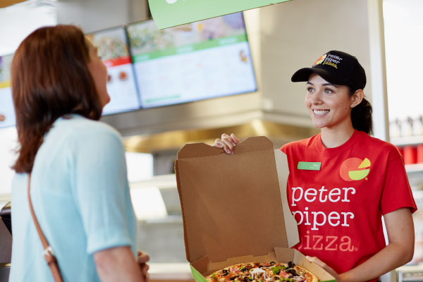 Pizza shown to customer